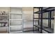 Functional storage room featuring sturdy metal shelving for organized home solutions at 2477 Misty Rose Ln, Loganville, GA 30052
