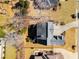 Overhead view of the home showcasing its roof, backyard and placement in neighborhood at 2885 Towne Village Dr, Duluth, GA 30097