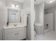 Modern bathroom featuring a white vanity, neutral paint and a shower-tub combo at 2885 Towne Village Dr, Duluth, GA 30097