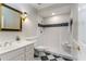 Classic bathroom featuring a walk-in shower, checkerboard tile, and stylish mirror at 2885 Towne Village Dr, Duluth, GA 30097