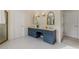 Spacious bathroom featuring a double sink vanity and adjacent shower at 2885 Towne Village Dr, Duluth, GA 30097