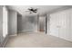 Bedroom featuring neutral colored walls, carpet and a ceiling fan at 2885 Towne Village Dr, Duluth, GA 30097