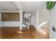 Inviting entryway featuring hardwood floors, white wainscoting, and staircase at 2885 Towne Village Dr, Duluth, GA 30097