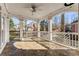 Covered porch featuring tile flooring and an ornate railing with an arched entrance at 2885 Towne Village Dr, Duluth, GA 30097