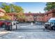 Brick building exterior behind a gated entrance at 327 3Rd Ne St # 1, Atlanta, GA 30308