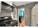 Efficient kitchen layout showcasing essential appliances and convenient storage at 327 3Rd Ne St # 1, Atlanta, GA 30308