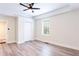 Bright, airy bedroom with light-colored walls and modern wood flooring at 1416 Mcpherson Se Ave, Atlanta, GA 30316