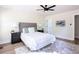 Relaxing bedroom with ceiling fan, neutral paint, plush rug, and views of the backyard at 1416 Mcpherson Se Ave, Atlanta, GA 30316