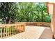 Wide wooden deck with railings offers outdoor living space at 1416 Mcpherson Se Ave, Atlanta, GA 30316