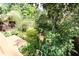 Lush landscaping surrounds the home's spacious wooden deck at 1416 Mcpherson Se Ave, Atlanta, GA 30316