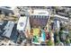 Stunning aerial view of a modern condominium complex with pool, and tennis court at 1820 Peachtree Nw St # 1207, Atlanta, GA 30309