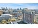 Panoramic city view from a high-rise condominium, showcasing the skyline and surrounding cityscape at 1820 Peachtree Nw St # 1207, Atlanta, GA 30309