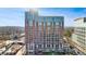 Stunning high-rise condo building featuring expansive windows, brick accents, and city views at 1820 Peachtree Nw St # 1207, Atlanta, GA 30309