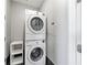 Convenient laundry area with stacked washer and dryer to maximize space at 1820 Peachtree Nw St # 1207, Atlanta, GA 30309