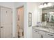 Well-lit bathroom featuring granite counters, white cabinets, and a separate toilet room for added privacy at 223 Misty View Dr, Canton, GA 30114