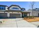 Inviting home exterior showcasing manicured lawn, covered porch, and a convenient two-car garage at 223 Misty View Dr, Canton, GA 30114