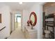 Hallway with a stylish mirror and decor leading to a bathroom and bedroom at 223 Misty View Dr, Canton, GA 30114