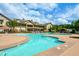 A luxurious outdoor pool with comfortable seating and a well-maintained pool deck at the community clubhouse at 223 Misty View Dr, Canton, GA 30114