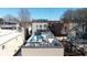 This aerial view captures the roof top decks and their proximity to neighborhood buildings at 307 Cherokee Se Ave # 9, Atlanta, GA 30312