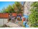 Outdoor living: Cozy backyard area featuring a fire pit, ample seating, privacy fence, and mature foliage at 307 Cherokee Se Ave # 9, Atlanta, GA 30312