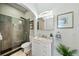 Modern bathroom features marble countertop vanity and tiled shower with rainfall showerhead at 307 Cherokee Se Ave # 9, Atlanta, GA 30312