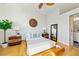 Bright bedroom features wooden floors, a ceiling fan and a neutral color palette at 307 Cherokee Se Ave # 9, Atlanta, GA 30312