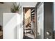 Sunlit front entryway with spiral staircase, and lush greenery and decor at 307 Cherokee Se Ave # 9, Atlanta, GA 30312