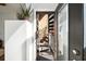 Entryway with a peek at the outdoor spiral staircase and potted plants at 307 Cherokee Se Ave # 9, Atlanta, GA 30312