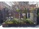 The property number 307 is on the fence in front of the building at 307 Cherokee Se Ave # 9, Atlanta, GA 30312