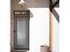 Stylish front door with a sidelight and modern hardware, enhancing curb appeal and security of this welcoming home at 307 Cherokee Se Ave # 9, Atlanta, GA 30312