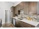 Kitchen features stainless steel appliances, modern cabinets, and stylish backsplash at 307 Cherokee Se Ave # 9, Atlanta, GA 30312