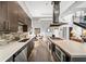 Kitchen with stainless steel appliances, tiled backsplash, modern cabinets, and a view to dining area at 307 Cherokee Se Ave # 9, Atlanta, GA 30312