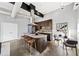 Modern kitchen boasts an island with bar seating, stainless steel appliances, and sleek cabinetry for a functional space at 307 Cherokee Se Ave # 9, Atlanta, GA 30312