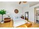 Inviting bedroom features natural light, a decorative ceiling fan, hardwood floors, and closet access at 307 Cherokee Se Ave # 9, Atlanta, GA 30312