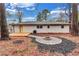 Lovely backyard with a wood deck and charming fire pit area perfect for entertaining at 2254 Glendale Drive, Decatur, GA 30032