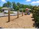 Community playground featuring swings and a slide, creating a fun and safe space for children to play at 1326 Harlequin Way, Stockbridge, GA 30281