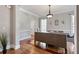 Bright dining room featuring wainscoting, hardwood floors and natural light at 1459 Hedgewood Nw Ln, Kennesaw, GA 30152