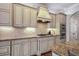 Well-appointed kitchen with custom cabinets and a chef-style gas cooktop at 1459 Hedgewood Nw Ln, Kennesaw, GA 30152