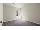 Bedroom with plush carpet and a window at 2628 Wild Laurel Ct, Norcross, GA 30071