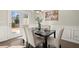 Elegant dining room featuring a modern table set and light fixtures at 2628 Wild Laurel Ct, Norcross, GA 30071