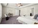 Spacious bedroom features a tray ceiling, sitting area and a ensuite bath at 2628 Wild Laurel Ct, Norcross, GA 30071