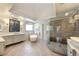 Bright bathroom with soaking tub, tiled shower, and double vanity at 4399 Jett Nw Pl, Atlanta, GA 30327