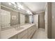 Spacious bathroom boasting a long double sink vanity and large mirror with great lighting at 4399 Jett Nw Pl, Atlanta, GA 30327