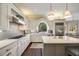 Bright and airy kitchen with white cabinets, stainless steel appliances, and a large island at 4399 Jett Nw Pl, Atlanta, GA 30327