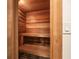 Luxurious home sauna featuring wood paneling, bench seating, and space for relaxation at 4399 Jett Nw Pl, Atlanta, GA 30327