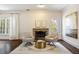 Sitting Room with fireplace, hardwood floors, and natural light at 4399 Jett Nw Pl, Atlanta, GA 30327