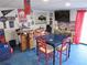 Basement features Buffalo Bills themed decorations, wet bar, and ample seating at 901 Guys Sw Ct, Lilburn, GA 30047