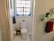 Cozy bathroom with a window, adding natural light to the space at 901 Guys Sw Ct, Lilburn, GA 30047