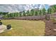 Expansive backyard with a well-maintained lawn and privacy fence at 39 Clubhouse Way, Acworth, GA 30101