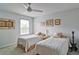 Bright bedroom with two twin beds, plush carpeting, guitar, and decorative art at 39 Clubhouse Way, Acworth, GA 30101